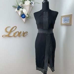 Black dress with side slit. New.